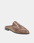 Front three-quarter view of the Dolce Vita Betzy Loafer in brown embossed suede with ruched moc toe and penny loafer detail.