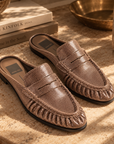 Dolce Vita Betzy Loafers in brown embossed suede styled in warm natural light.