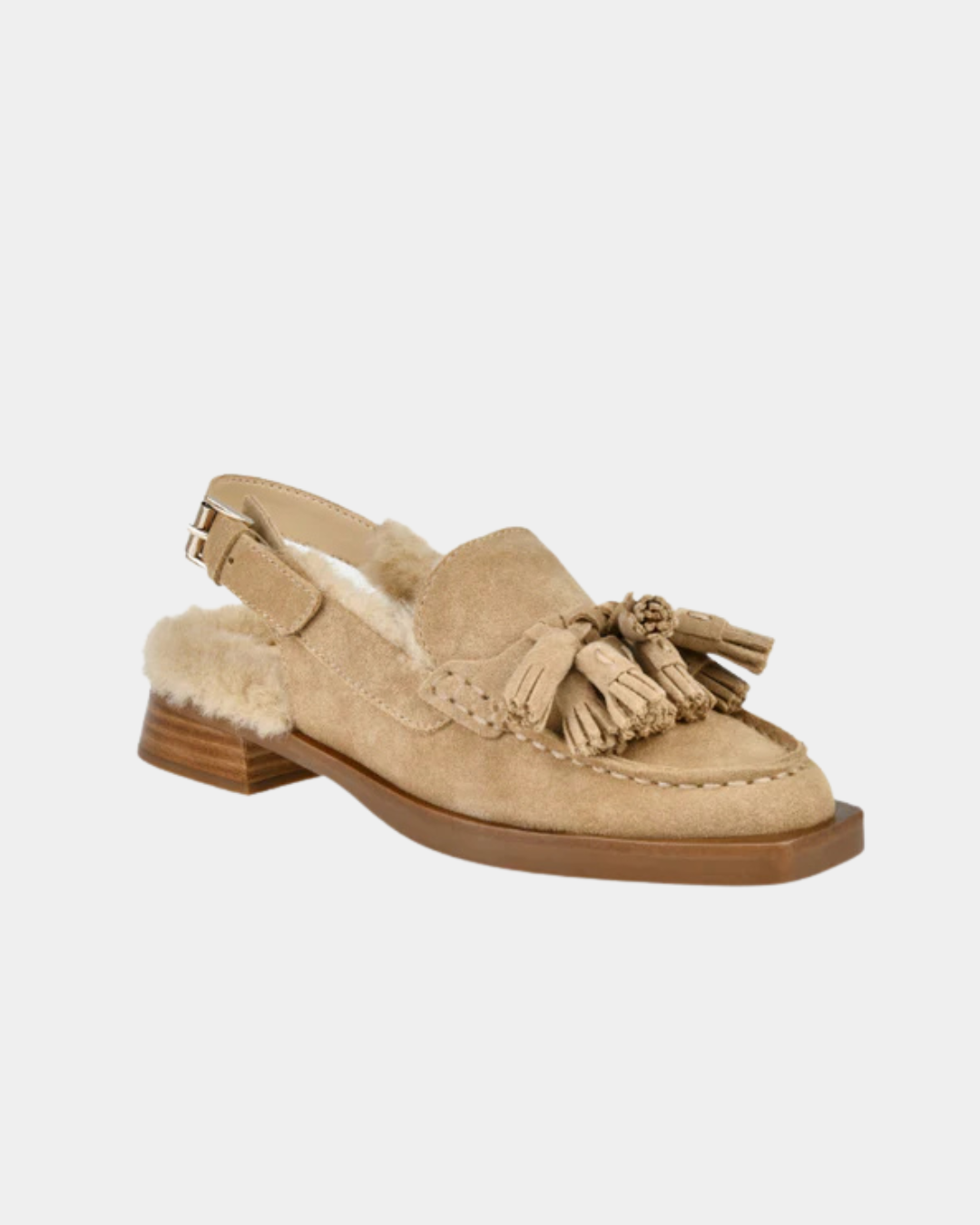 Dolce Vita Hamlit women’s mule featuring smooth suede and refined tassel detailing.