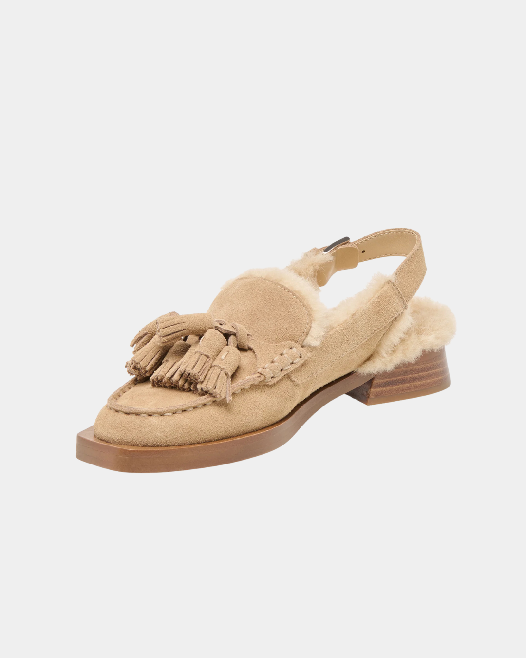 Dolce Vita Hamlit women’s mule featuring smooth suede and refined tassel detailing.