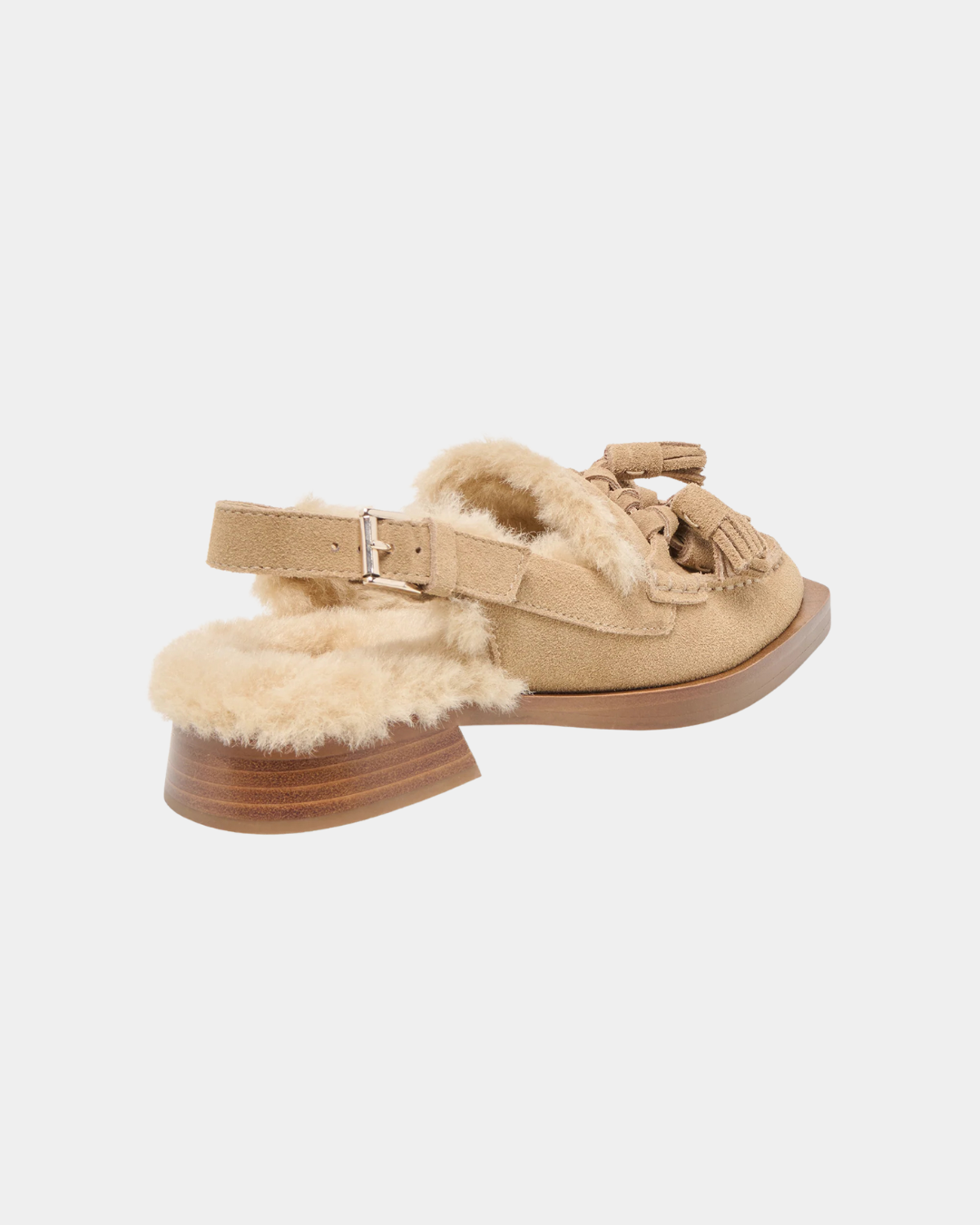Dolce Vita Hamlit women’s mule featuring smooth suede and refined tassel detailing.