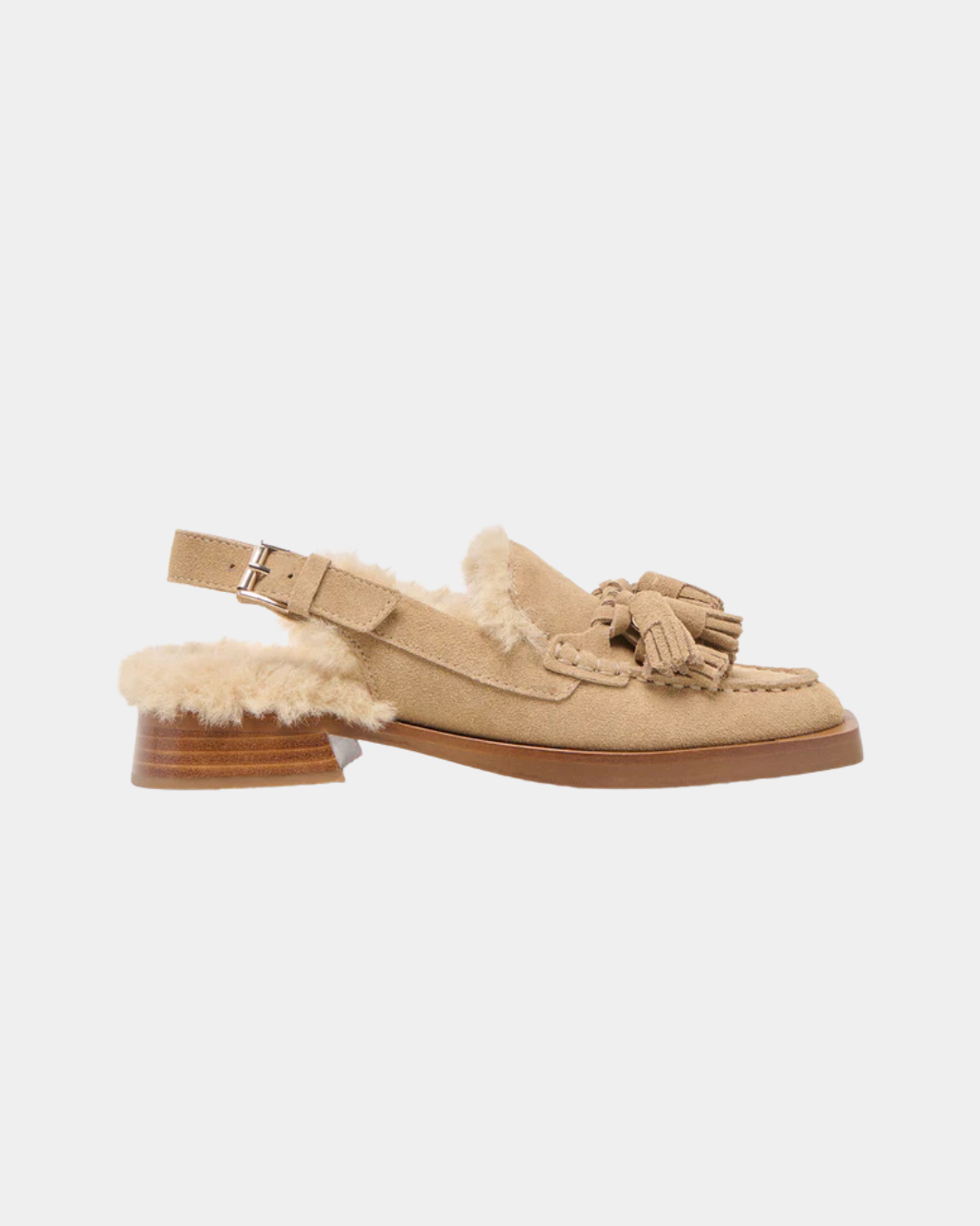 Dolce Vita Hamlit women’s mule featuring smooth suede and refined tassel detailing.