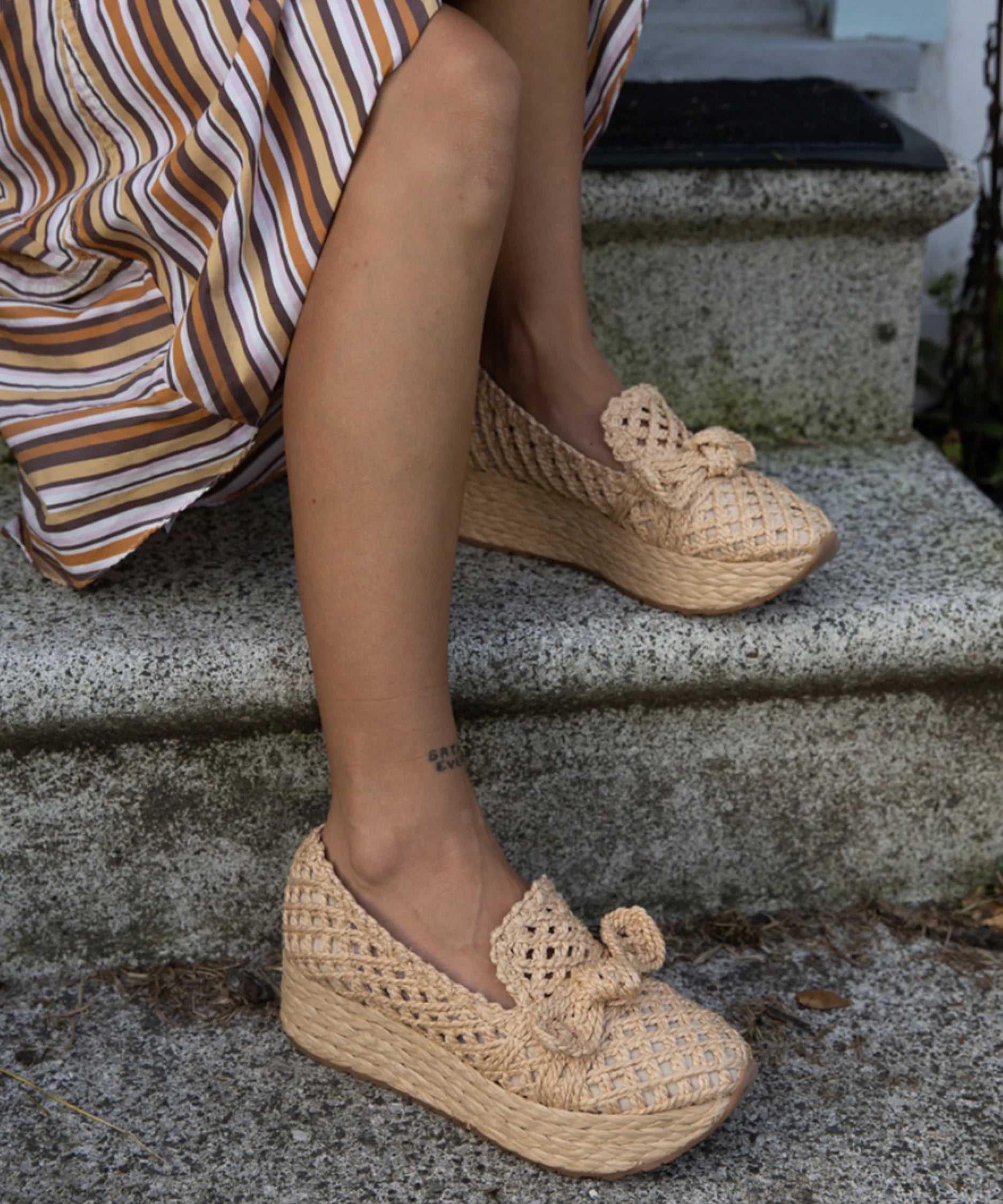 Jaka espadrille wedge by Dolce Vita featuring woven raffia and a classic espadrille sole.