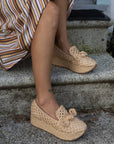 Jaka espadrille wedge by Dolce Vita featuring woven raffia and a classic espadrille sole.