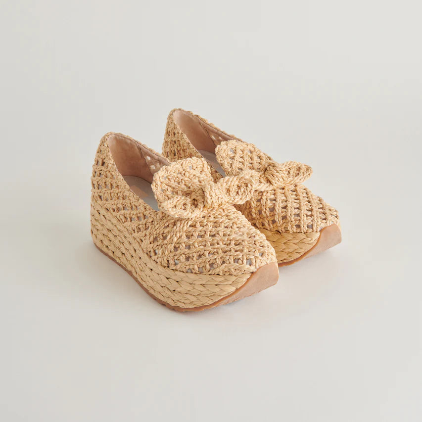 Jaka espadrille wedge by Dolce Vita featuring woven raffia and a classic espadrille sole.