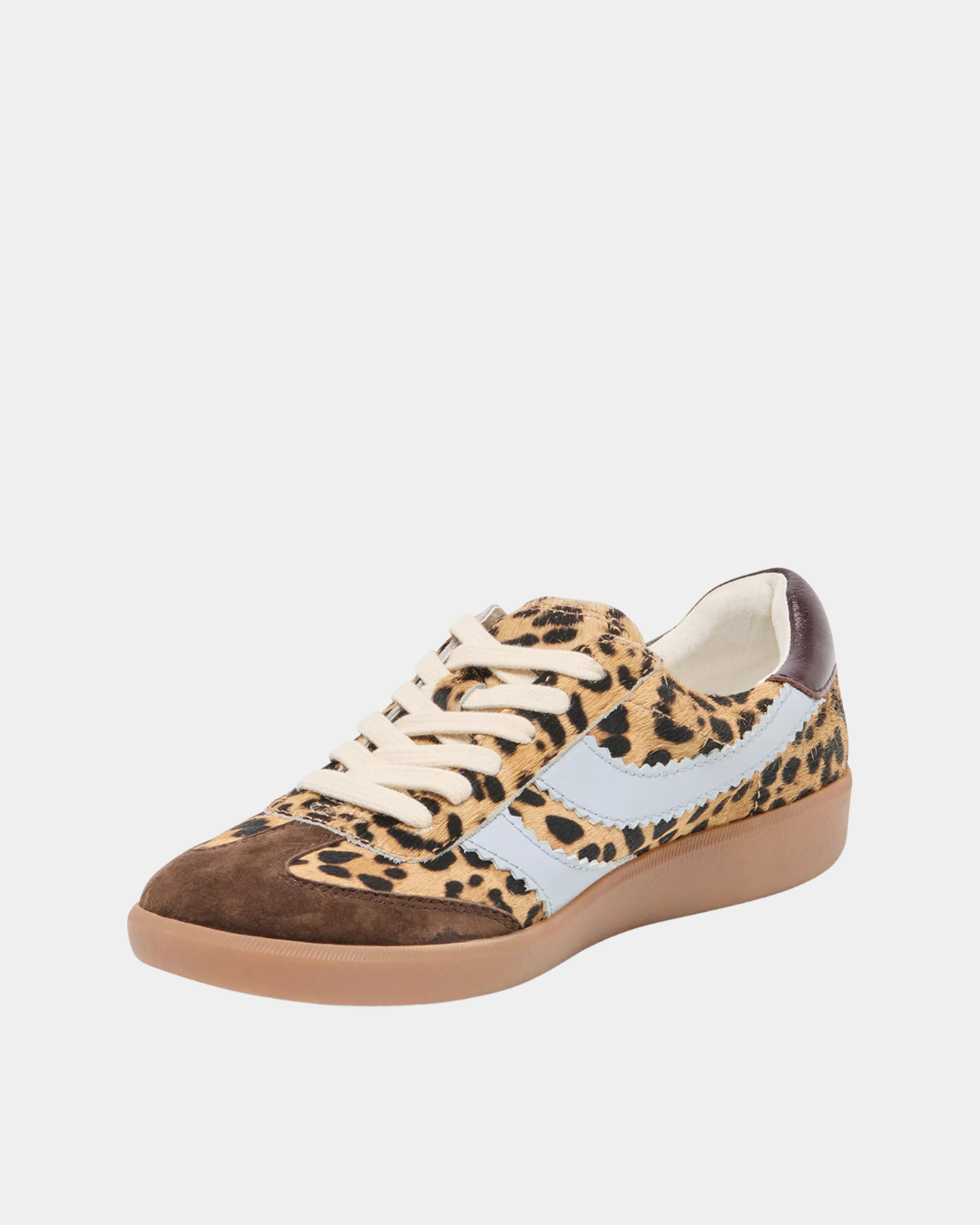 Three-quarter view of the Dolce Vita Merit Leopard Sneakers featuring a leopard calf hair upper, premium suede details, leather accents, and a comfortable rubber sole.