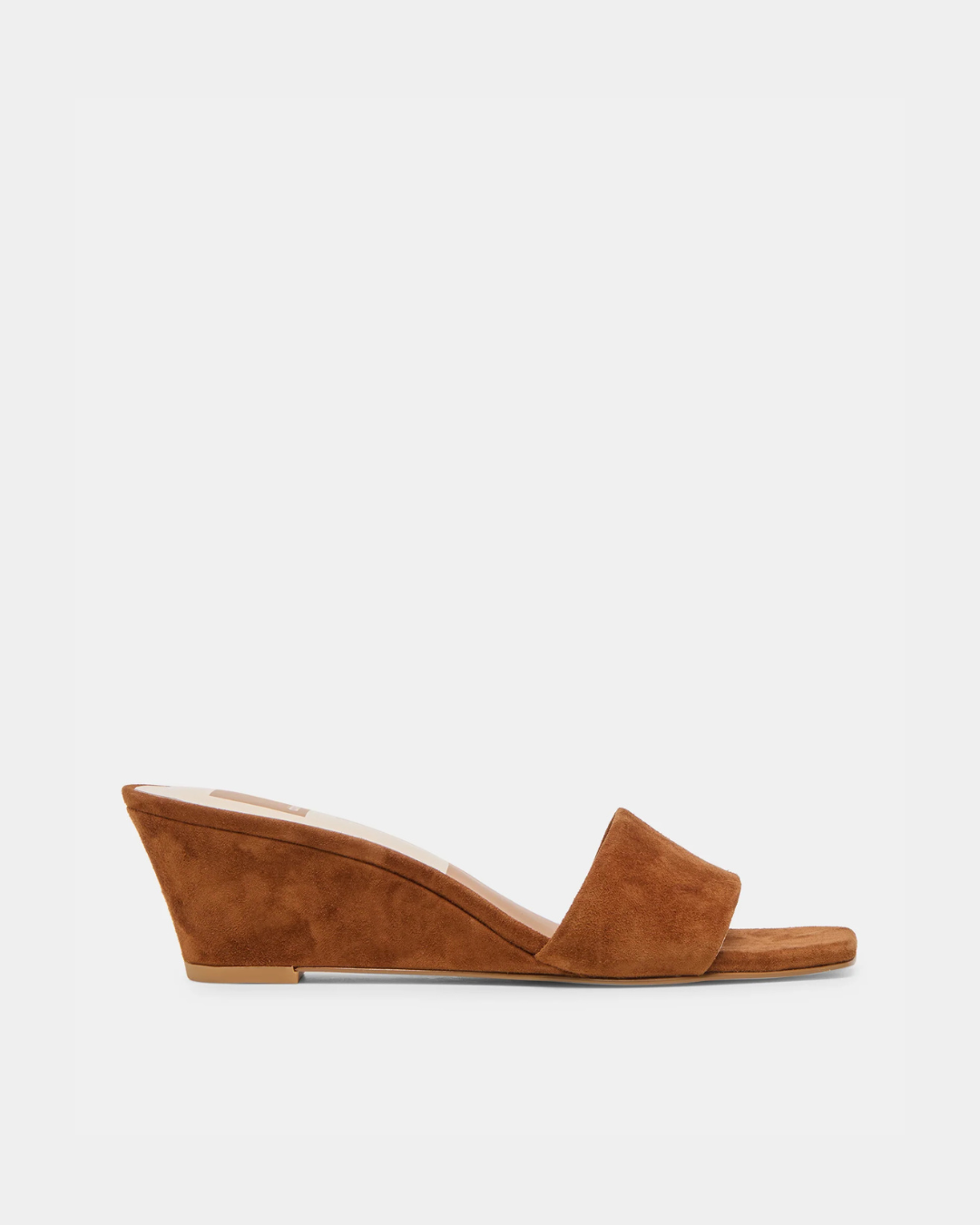 Dolce Vita Qaily women’s wedge crafted from genuine suede with a modern, versatile silhouette.
