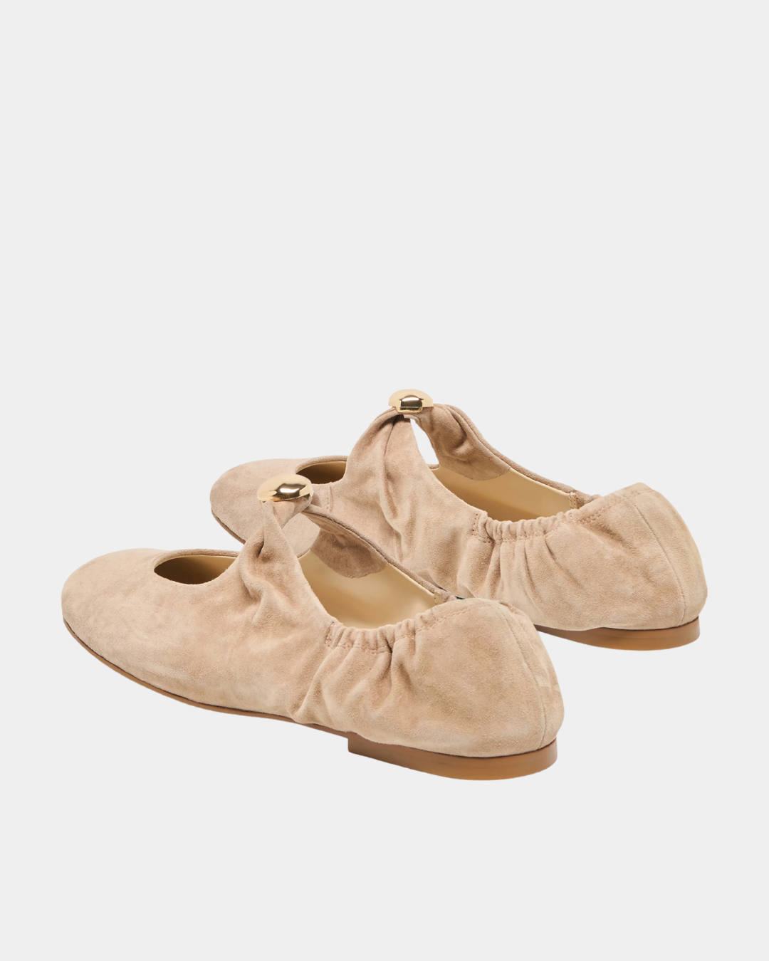 Dolce Vita Suede Cornel Ballet Flats in camel with gathered heel and gold hardware, rear angled view.
