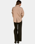 Back view of the Elan Corey striped button down shirt in Camel Stripe showing the distinctive button-back detail.