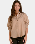 Close-up of the Elan Corey shirt in Camel Stripe showing the point collar, white buttons and fine striped pattern.