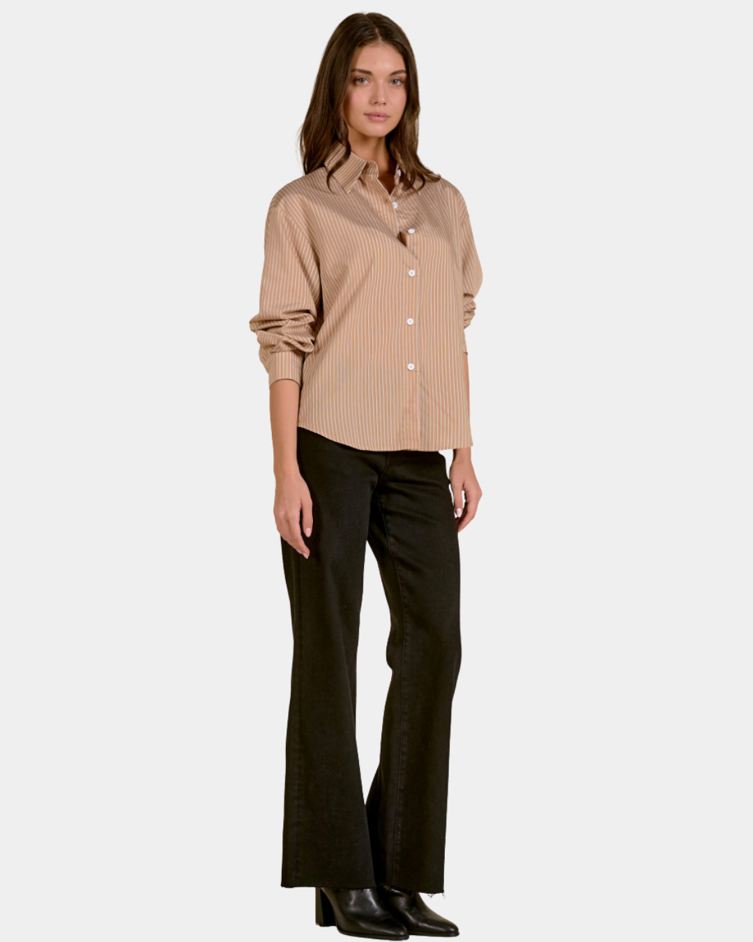 Model wearing the Elan Corey Camel Stripe button down shirt styled with black jeans.