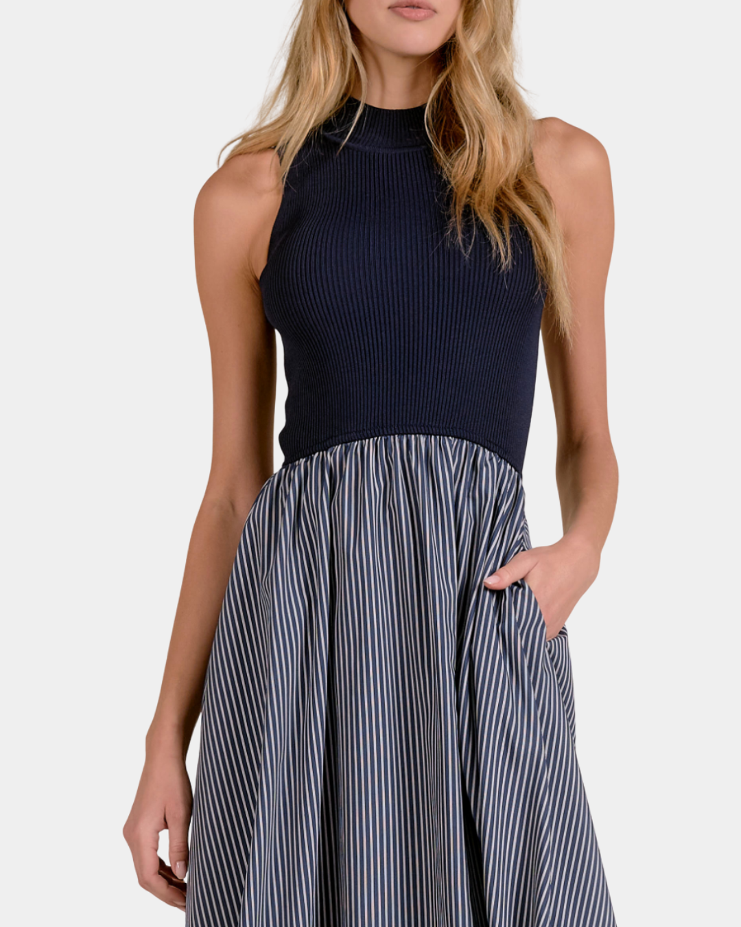 Close-up of the Elan Harlow mixed media dress showing the navy ribbed mock-neck bodice and Blue Stripe skirt.