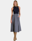 Elan Harlow mixed media midi dress in Blue Stripe with navy ribbed bodice and full striped skirt, front view.