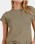 Detail of the Elan Sam Short Sleeve Sweater in Light Olive showing the crew neckline and ribbed trim