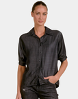 Front view of the Elan Washed Denim Button Down Shirt in Black styled with black denim