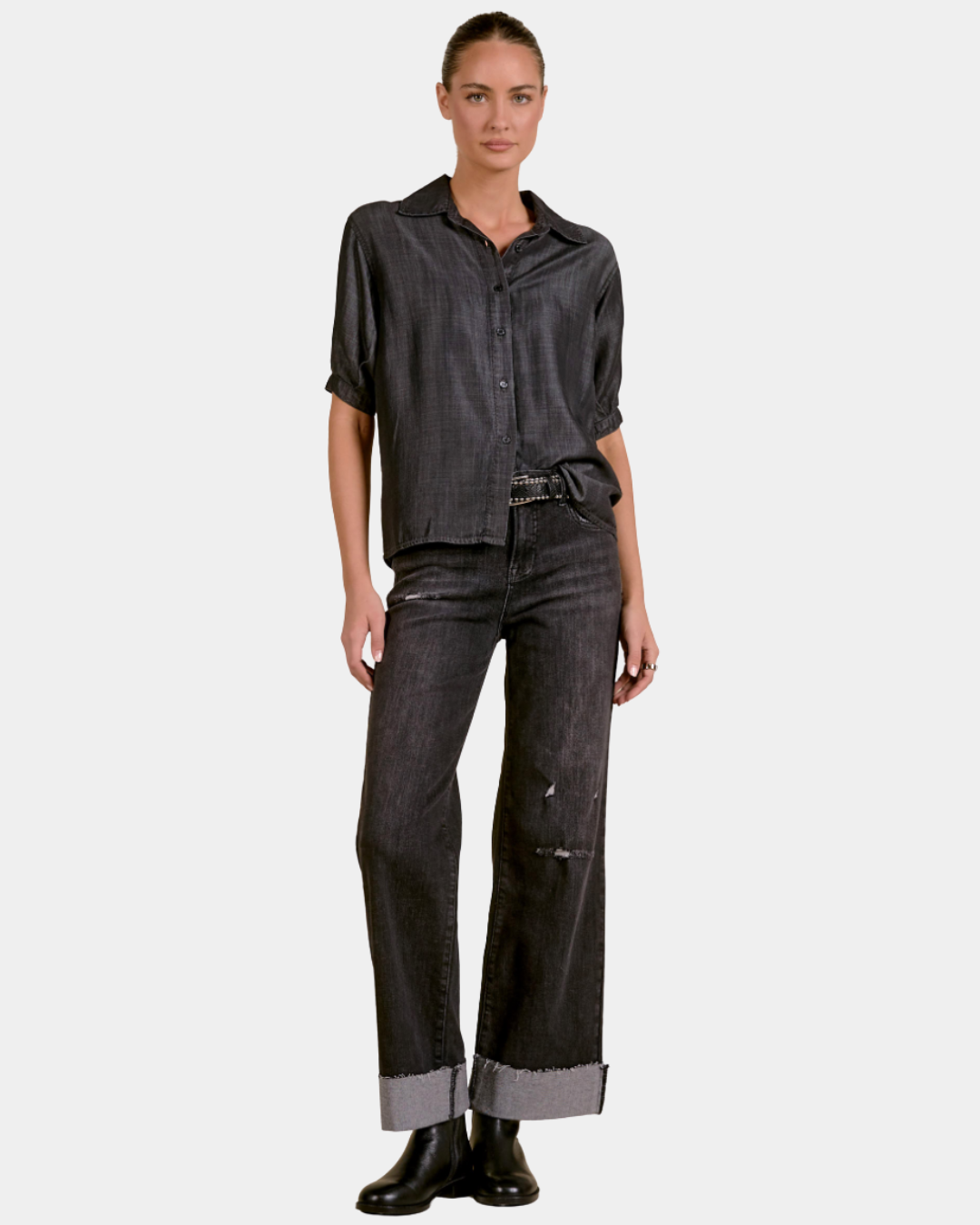 Elan Washed Denim Button Down Shirt in Black styled with cuffed black jeans