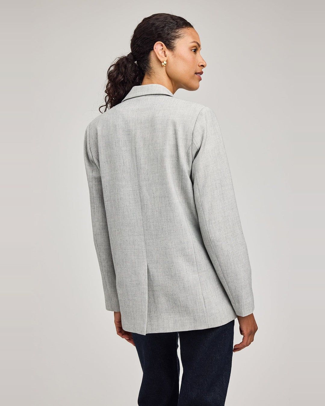 Back view of the Gentle Fawn Jeanie Blazer in heather ash with a center back vent