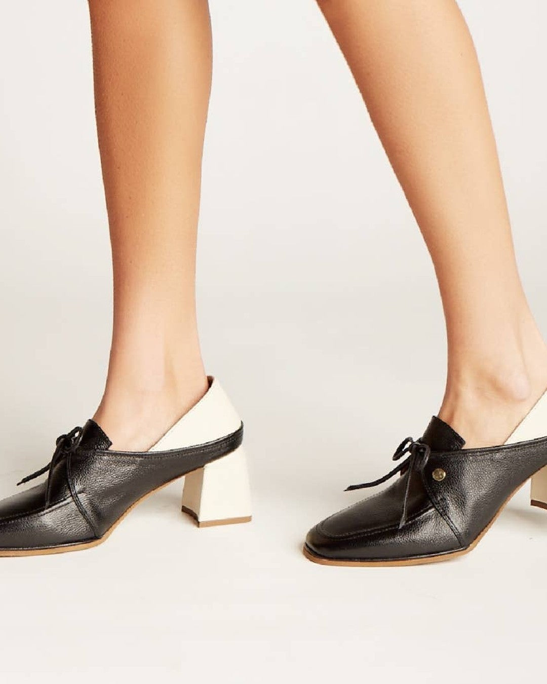 Back view of Stivali New York Focus loafers with off-white heels