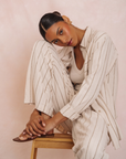 Gentle Fawn Portia linen shirt and Finley linen pants matching set styled in a relaxed lifestyle setting
