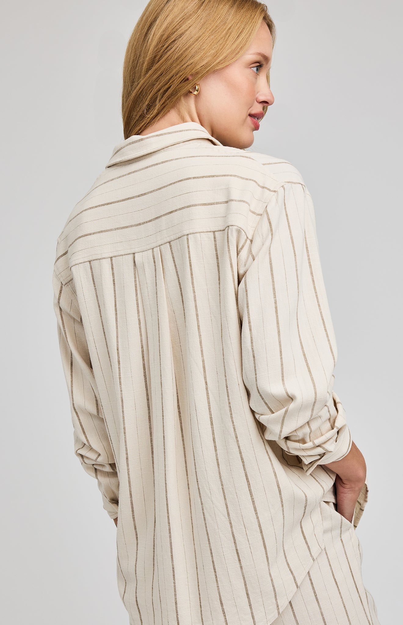Back view of Gentle Fawn Portia linen button down shirt in neutral stripe fabric