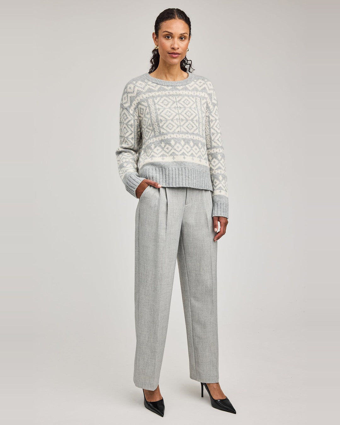 Model in heather grey Gentle Fawn Trina Pants styled with a grey and cream Fair Isle sweater