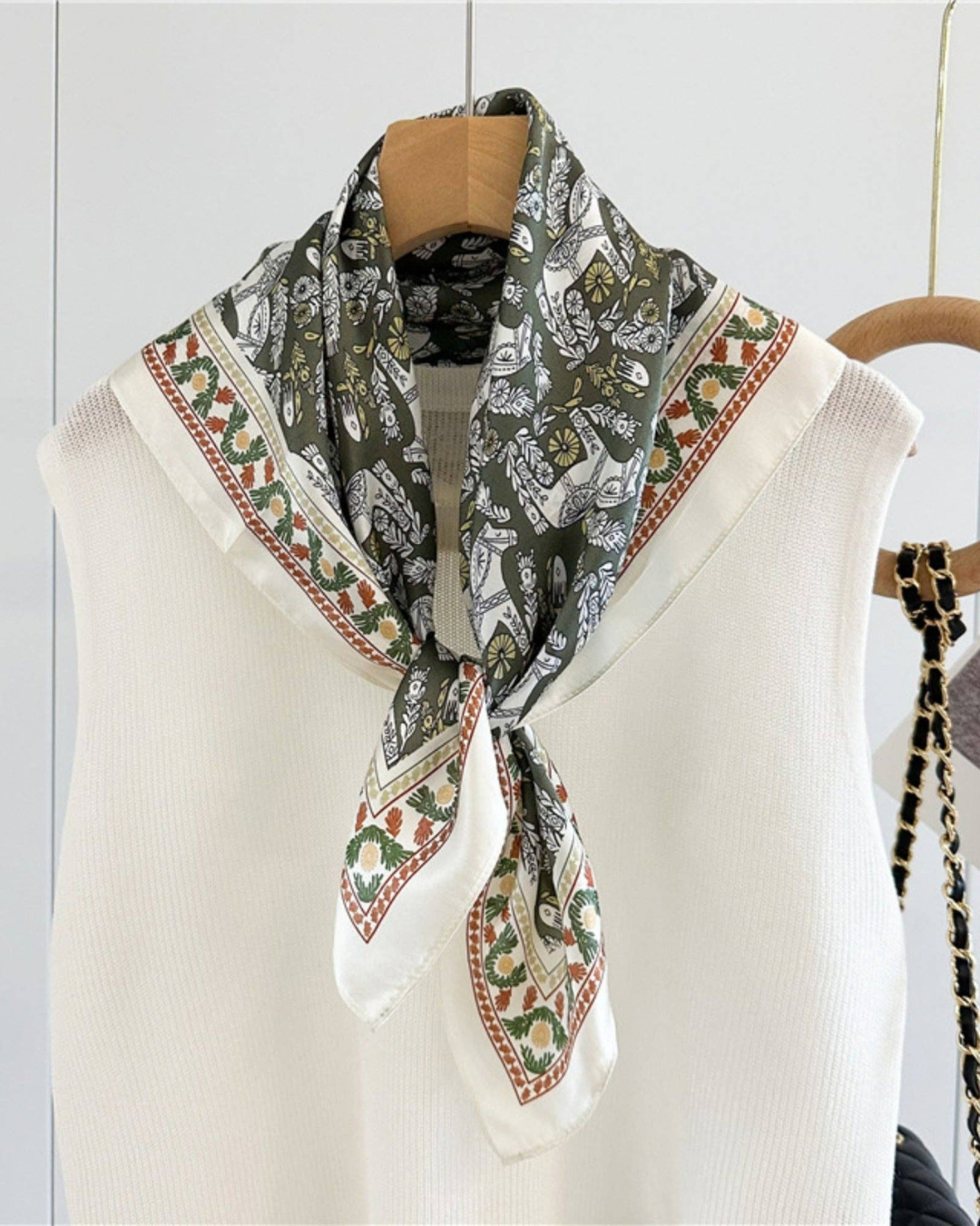 Greek Horse Mulberry Silk Scarf tied at the neck with olive and ivory print