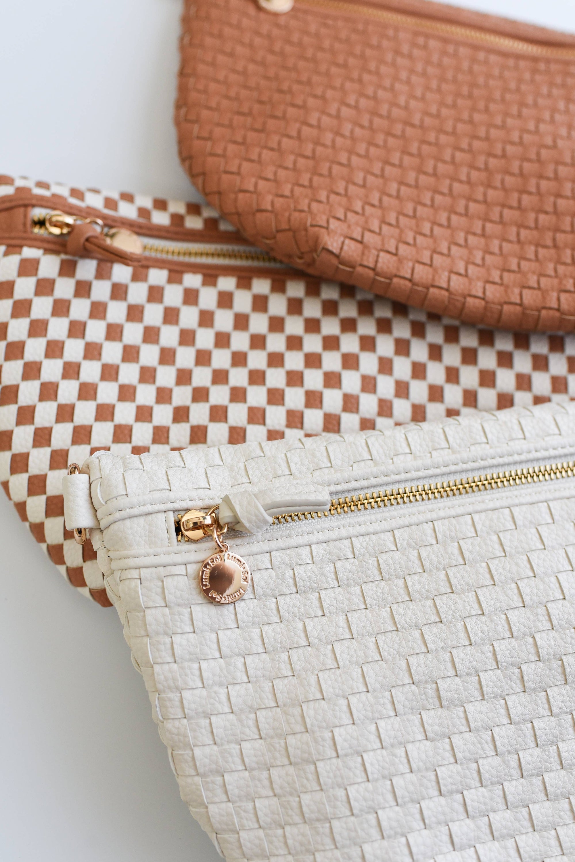 Detailed view of clay checkered woven vegan leather