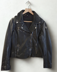 Front view of the Mauritius Christy Black Star Leather Jacket crafted from premium lambskin leather with moto styling, asymmetrical zipper, and subtle distressed seam detailing.