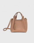 Montemare Sedona Crossbody in Latte featuring braided top handles, removable crossbody strap, tassel detail, gold hardware and orange accent stitching.