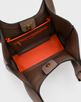 Montemare Sedona Tote in Cocoa Bean interior view with orange contrast lining and zip pocket