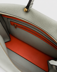 Montemare Vienna Small Carry On Tote in Blakes Blue interior view with orange lining and zip pocket