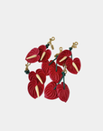 Oceans End red anthurium bag charms grouped together showing floral design and texture