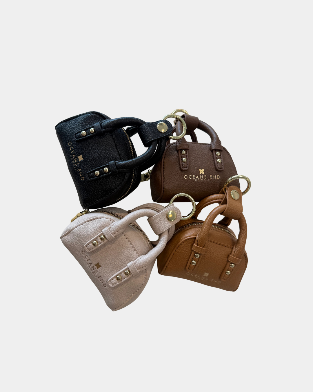 Oceans End mini handbag charm in multiple colors showing textured vegan leather detail