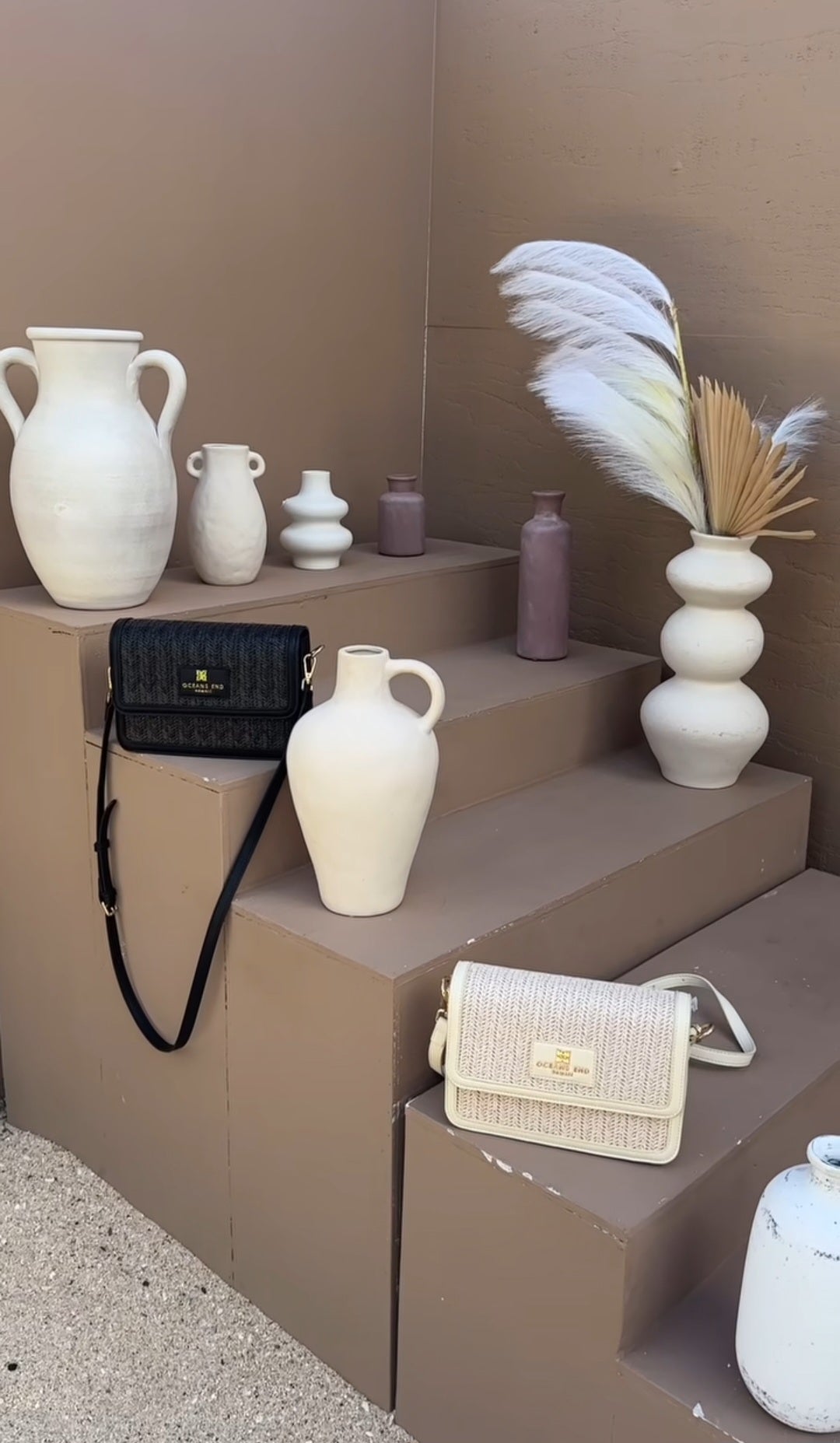 Oceans End Giovanni crossbody bag with embossed Pikake lei detail