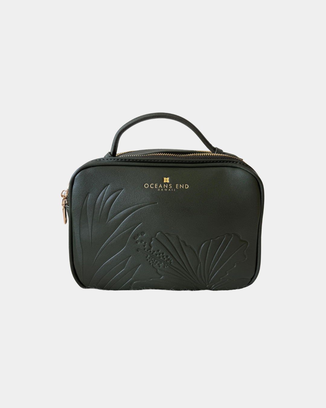 Front view of the Oceans End Justine 2.0 emerald crossbody handbag showcasing the embossed tropical hibiscus artwork and structured silhouette.