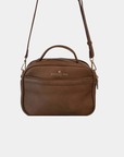 Back view of the Oceans End Justine 2.0 mocha crossbody bag featuring a convenient exterior slip pocket, top handle, and adjustable shoulder strap.