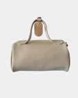 Back view of the Oceans End Lehua convertible handbag in creme vegan leather