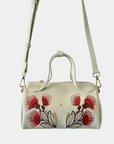 Oceans End Lehua convertible handbag in creme with removable crossbody strap and lehua flower embroidery