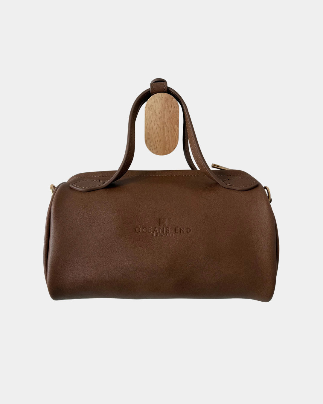 Back view of the Oceans End Lehua convertible handbag in mocha vegan leather