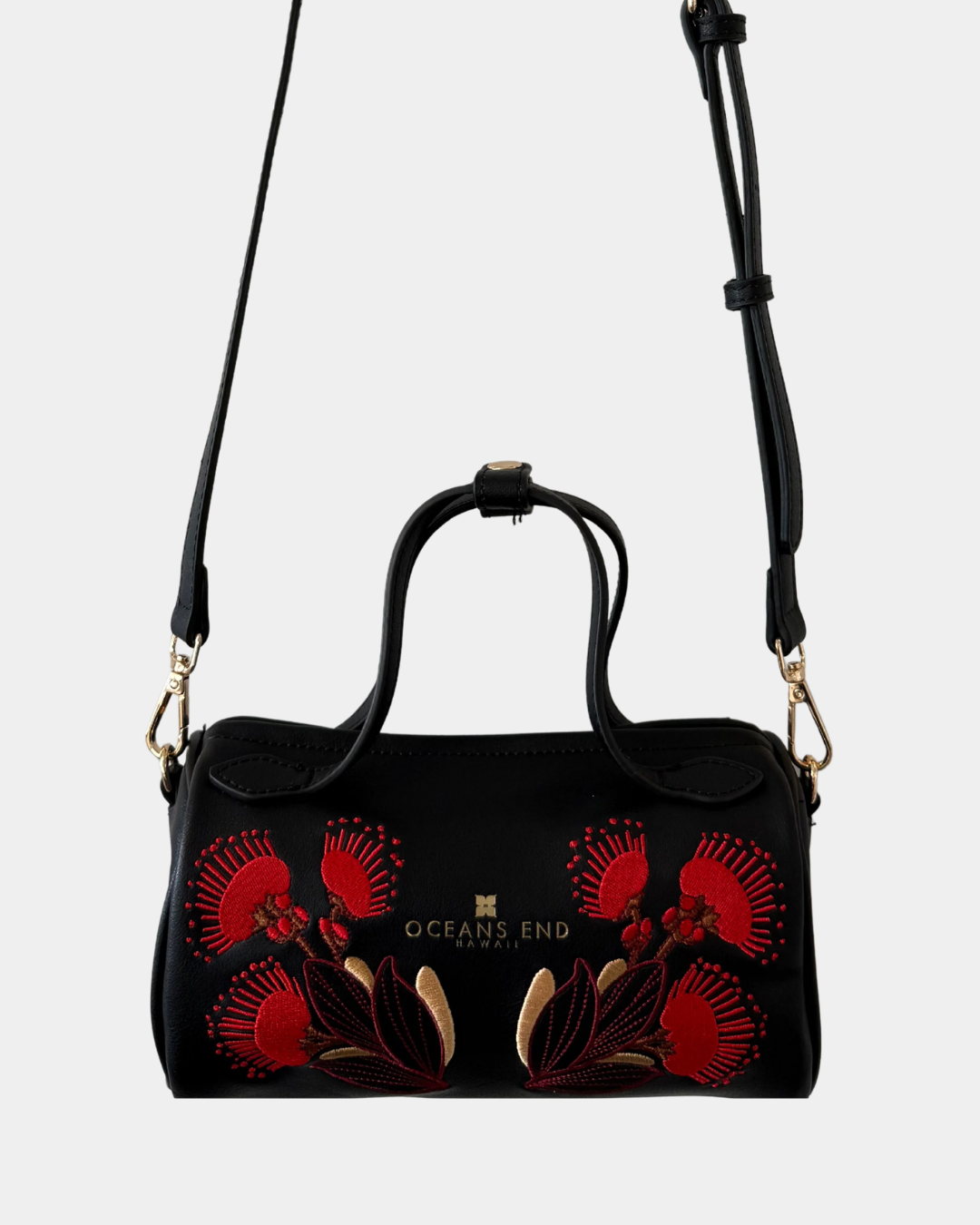 Oceans End Lehua convertible handbag in onyx with removable crossbody strap and lehua flower embroidery