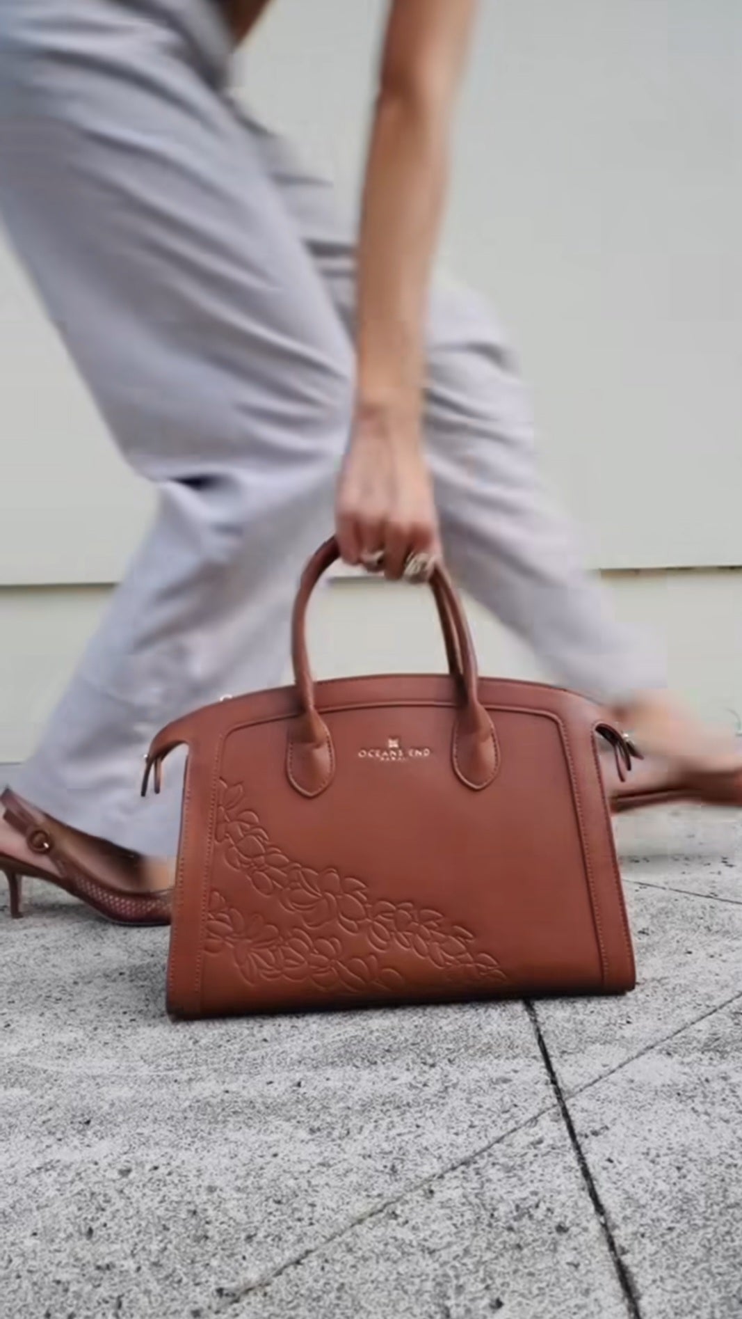 Oceans End Leialoha handbag with embossed puakenikeni lei design