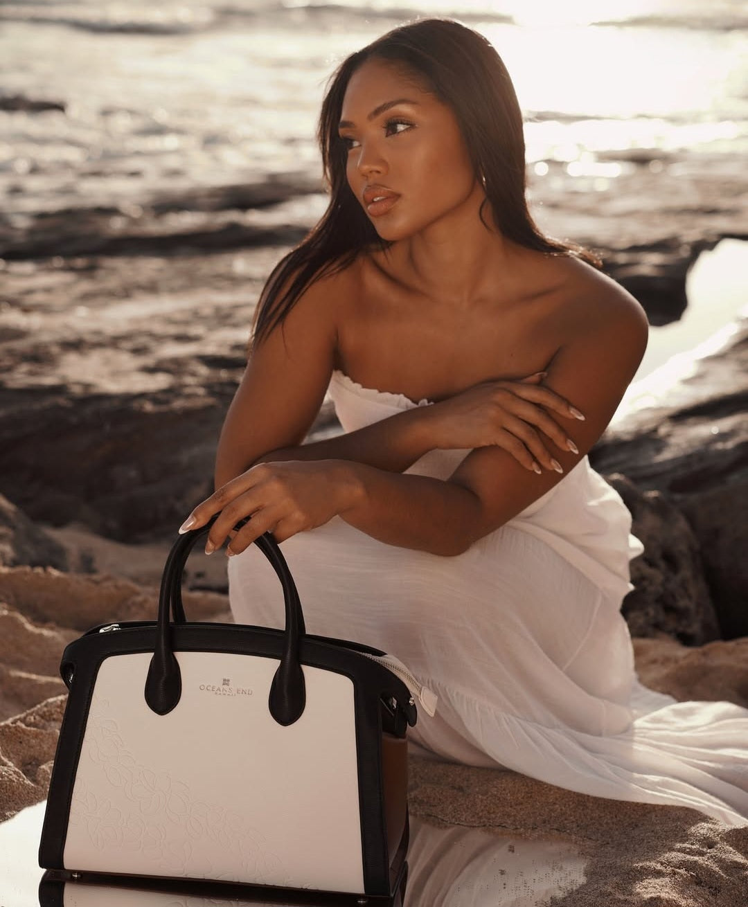 Oceans End Leialoha handbag with embossed puakenikeni lei design