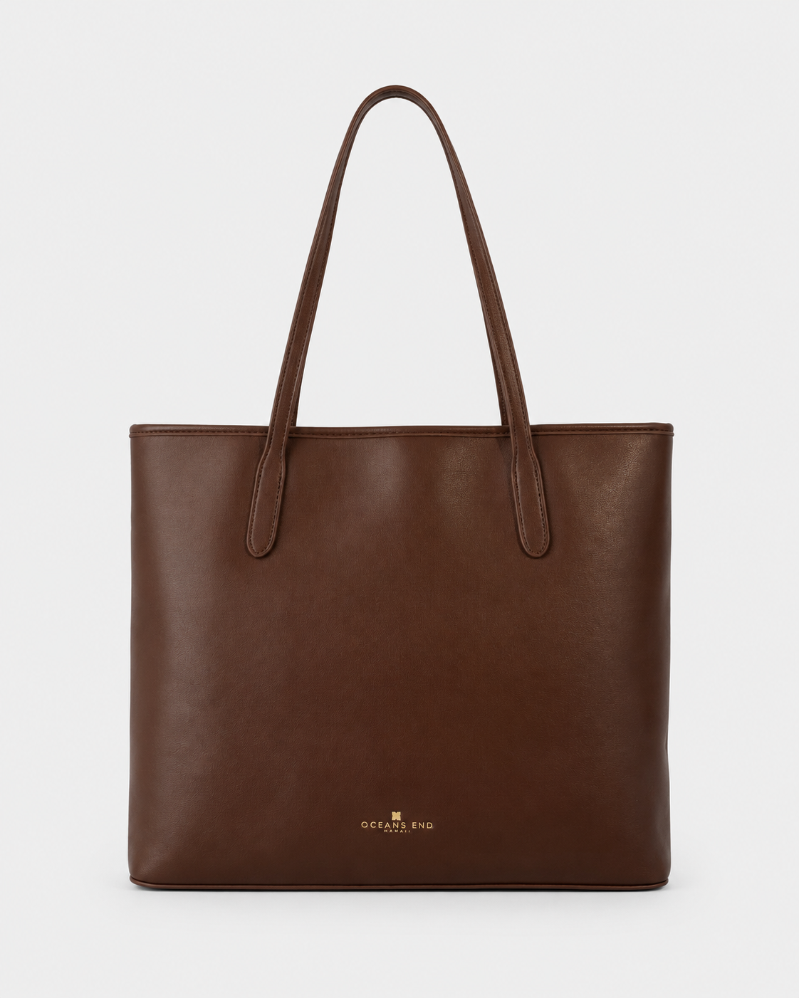 Back view of the Oceans End Marnie Tote in Chestnut with long shoulder straps and gold logo