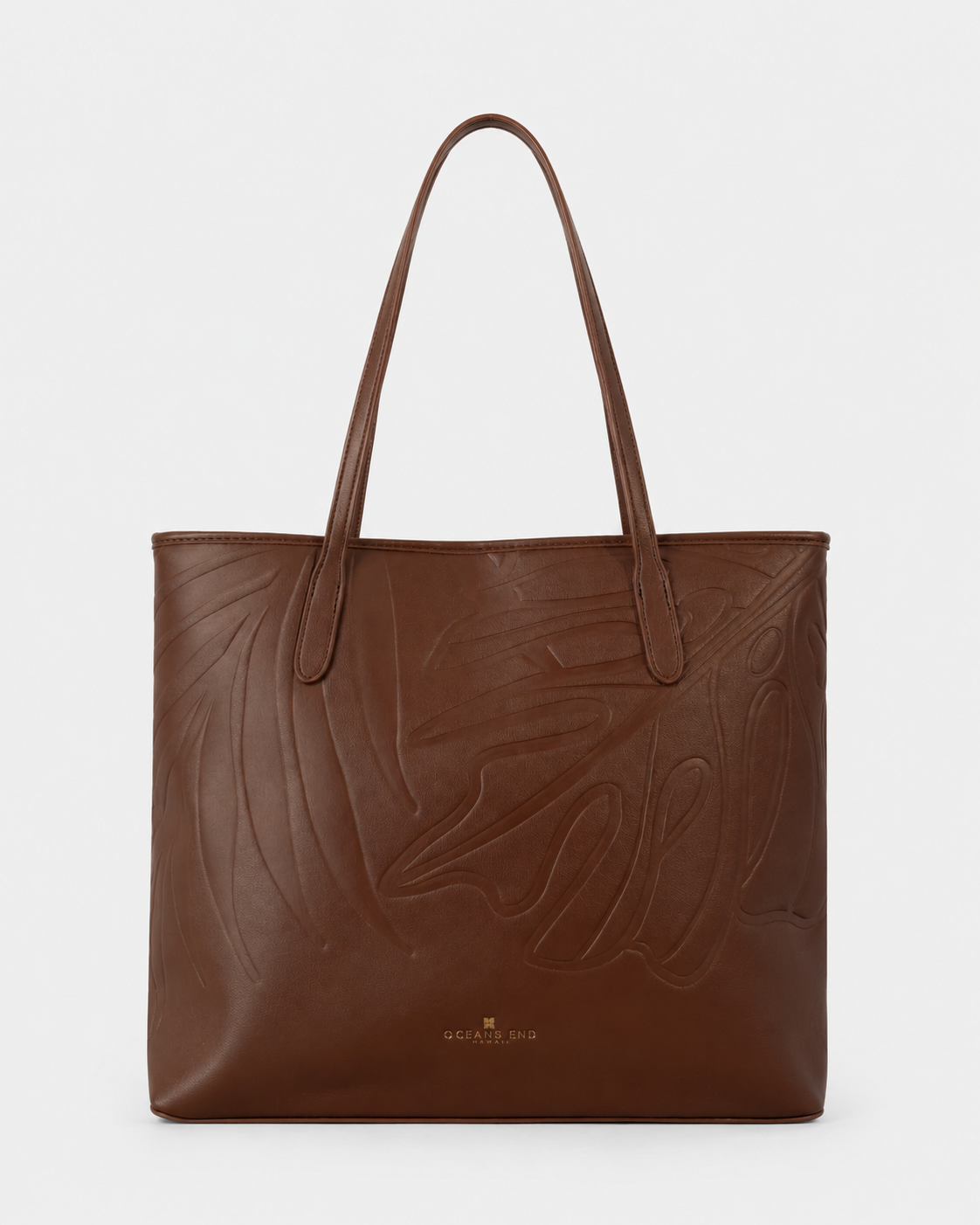 Oceans End Marnie Tote in Chestnut with embossed tropical design and long shoulder straps
