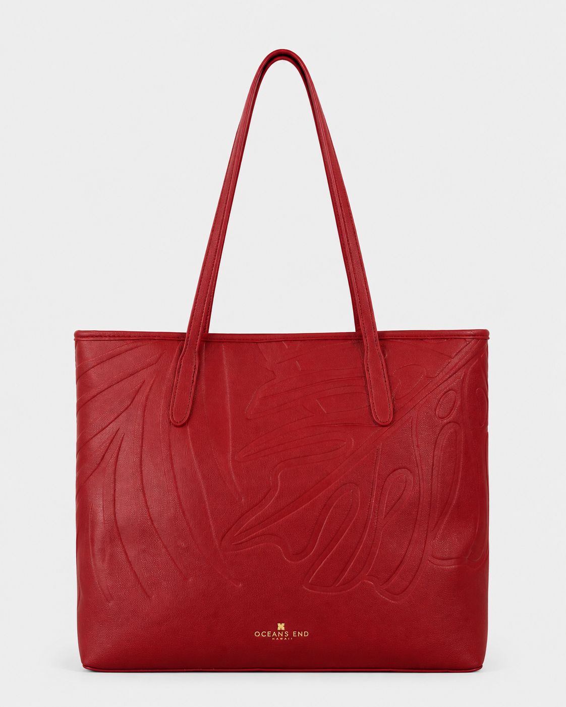 Oceans End Marnie Tote in Crimson with embossed tropical design and long shoulder straps