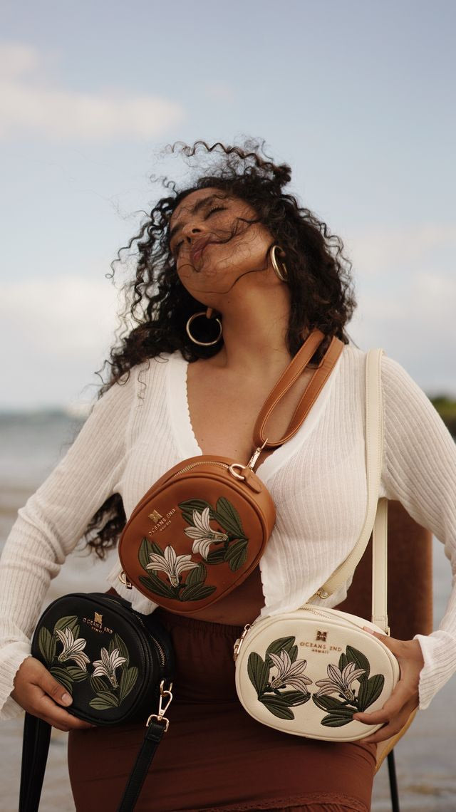 Oceans End Naupaka crossbody bag with embroidered floral design