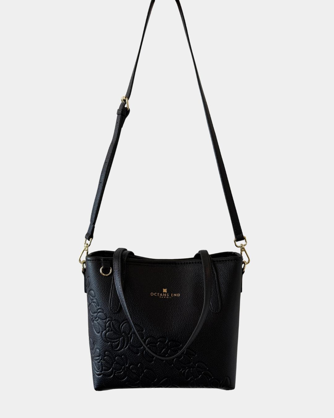 Oceans End Shawna convertible tote bag in onyx shown as crossbody with adjustable strap