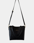 Oceans End Shawna convertible tote bag in onyx shown as crossbody with adjustable strap