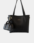 Oceans End Shawna convertible tote bag shown with the Oceans End Claudia mini handbag keychain charm.
