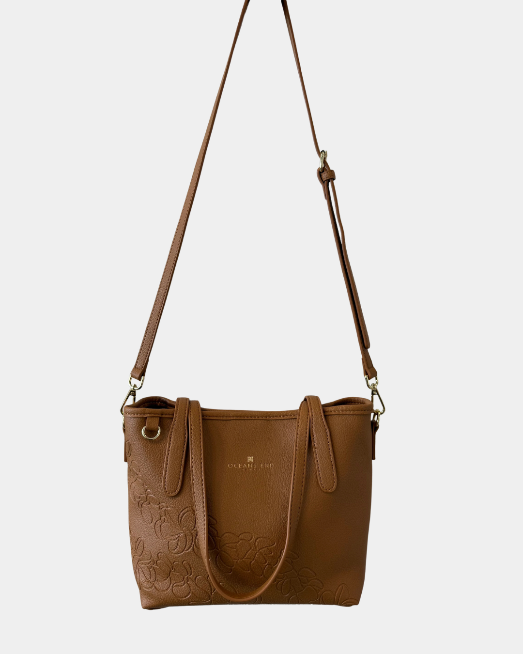 Oceans End Shawna convertible tote bag in tuscan worn as crossbody with adjustable strap